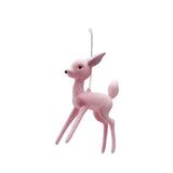 A 6-1/2 inch tall pink glittered plastic deer ornament