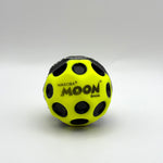 Yellow assorted Waboba Moon Ball on a white background