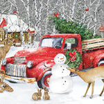 Jigsaw puzzle box for A Country Christmas, featuring a log cabin and snowman scene