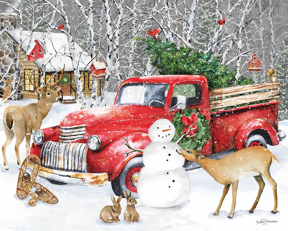 Jigsaw puzzle box for A Country Christmas, featuring a log cabin and snowman scene