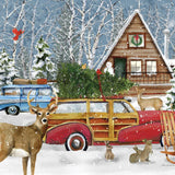 Jigsaw puzzle box for A Country Christmas Retreat, featuring a snowy A-frame cabin and Christmas tree wagon