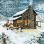 Jigsaw puzzle box for A Smoky Mountain Christmas, featuring Santa and a snowy cabin scene