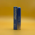Alleyoop blue cosmetic game face product  trailblazer packaging with branding on a yellow gradient background
