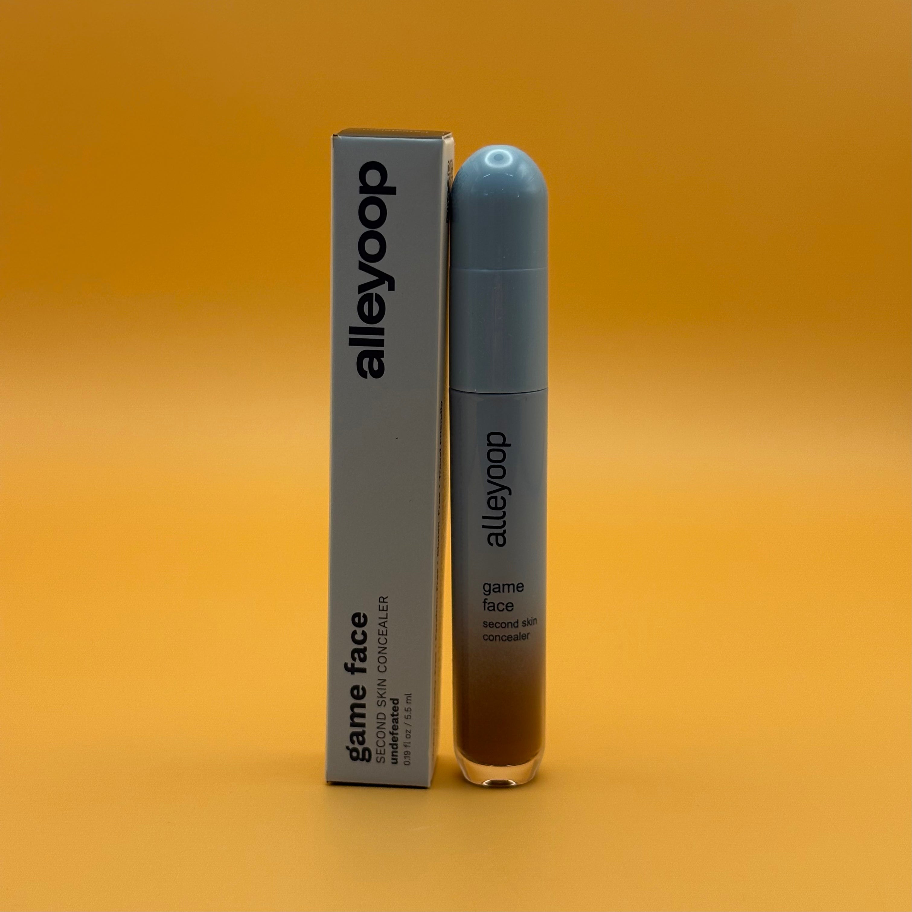Alleyoop game face second skin concealer undefeated packaging on a gradient orange background