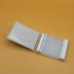 Packaged makeup remover cotton swabs with a clear plastic case on an orange background