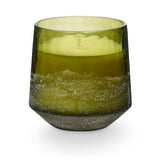 A Balsam & Cedar scented candle in a Baltic glass vessel
