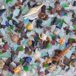 Jigsaw puzzle box for Beach Treasure, featuring colorful sea glass on the shore