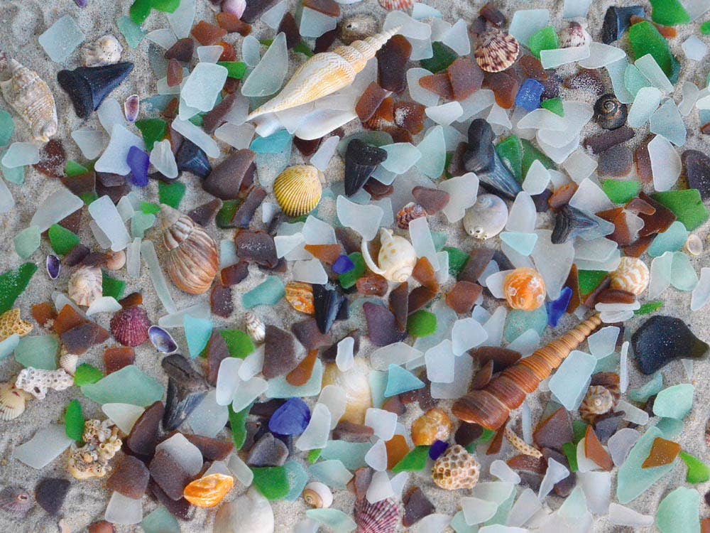 Jigsaw puzzle box for Beach Treasure, featuring colorful sea glass on the shore