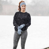 A pair of gray Britt's Knits ThermalTech 2.0 gloves with ribbed cuffs