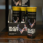 Buck Shot energy drink cans in a display with a blurred background