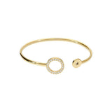 Stainless steel bangle with a crystal-set element