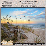 Jigsaw puzzle box for Coastal Sunrise, featuring a pink and gold sunrise over the beach