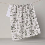 Cowboy Claus Tea Towel - Holiday 2026 - Pages & Parcels