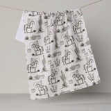 Cowboy Claus Tea Towel - Holiday 2026 - Pages & Parcels