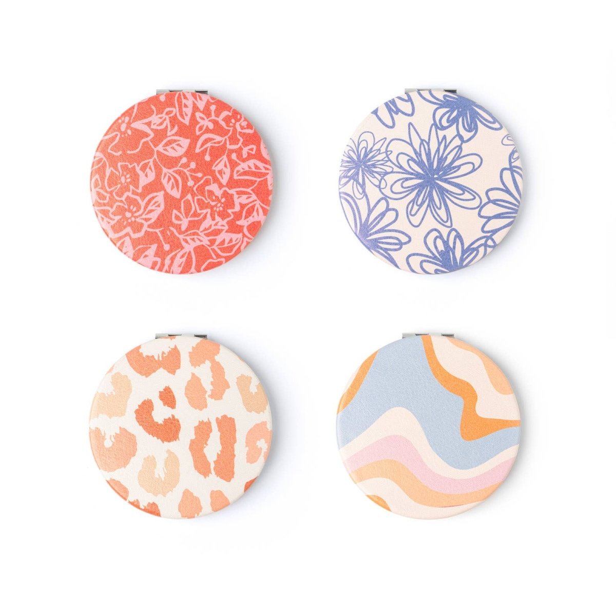 A round Crush I Feel Seen compact mirror with printed design