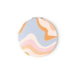 A round Crush I Feel Seen compact mirror with printed design