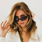 Black cat eye sunglasses with a classic silhouette