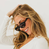 Black cat eye sunglasses with a classic silhouette