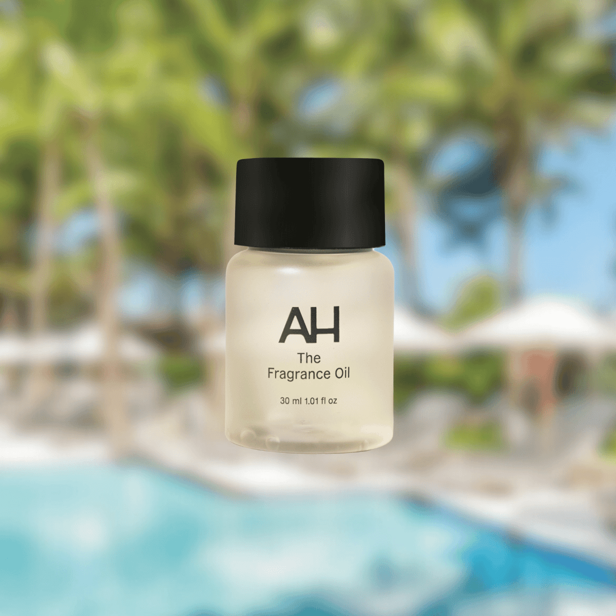 Bottle of Aura House Collins fragrance oil, a bright floral blend of lemon, magnolia, and musk