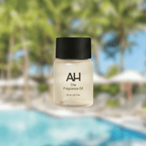 Bottle of Aura House Collins fragrance oil, a bright floral blend of lemon, magnolia, and musk
