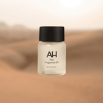 Bottle of Aura House Dubai fragrance oil, a gourmand blend of vanilla, coconut, and sandalwood