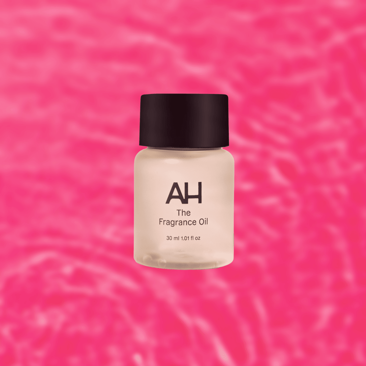 Bottle of Aura House Manifest fragrance oil, an ambery blend of Egyptian musk, amber, and sandalwood