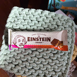 Einstein Energy protein bar on a knitted surface