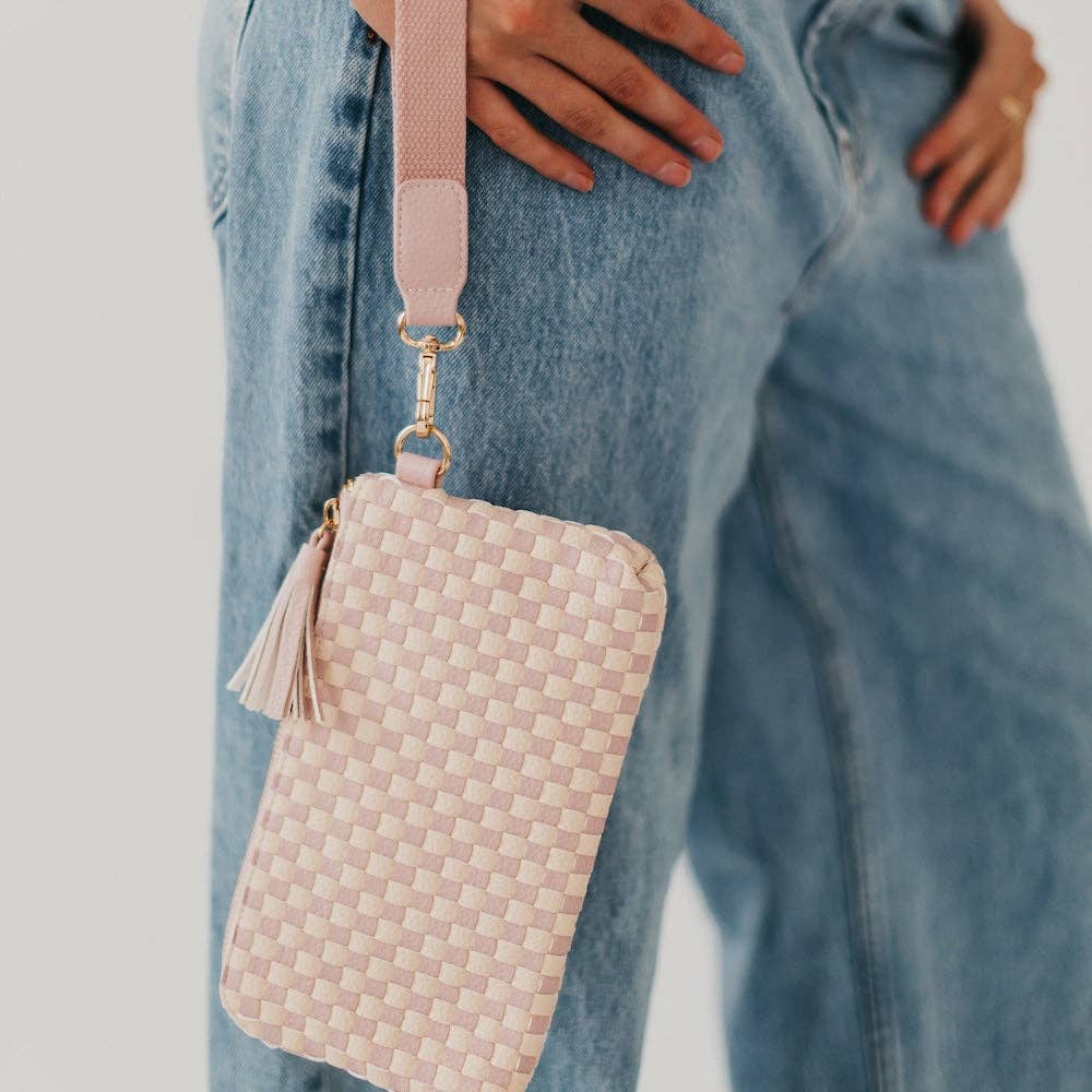 Black woven vegan leather clutch with a wristlet strap