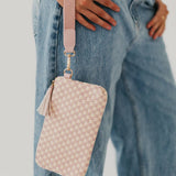 Black woven vegan leather clutch with a wristlet strap