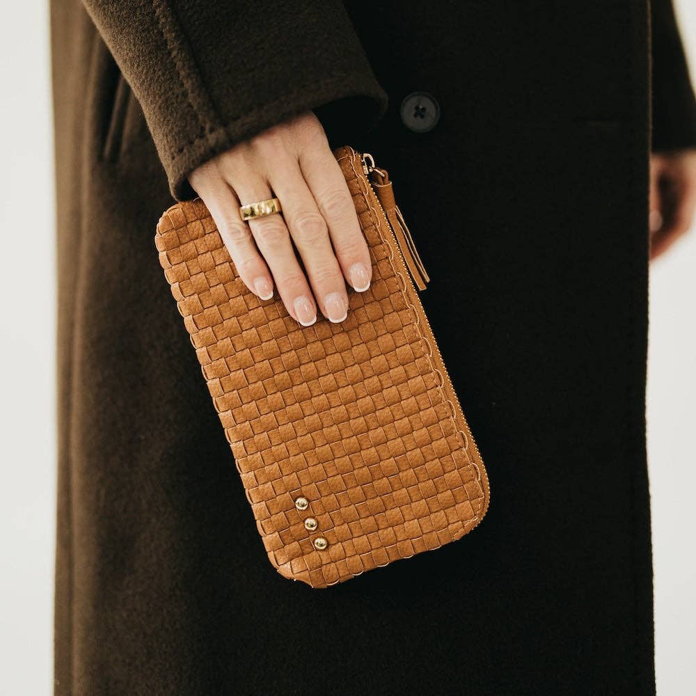 Black woven vegan leather clutch with a wristlet strap