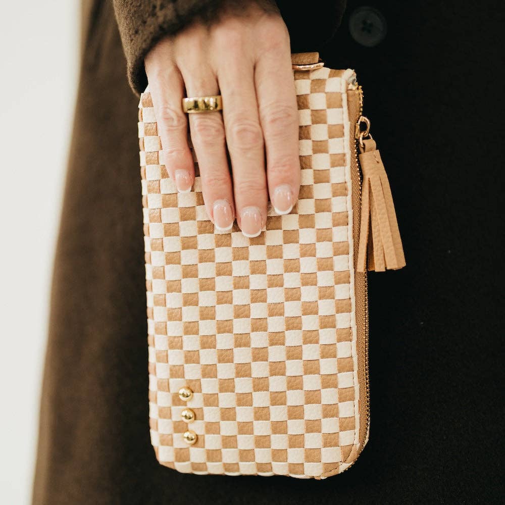 Black woven vegan leather clutch with a wristlet strap
