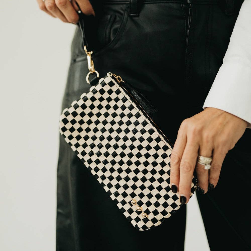 Black woven vegan leather clutch with a wristlet strap