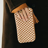 Black woven vegan leather clutch with a wristlet strap