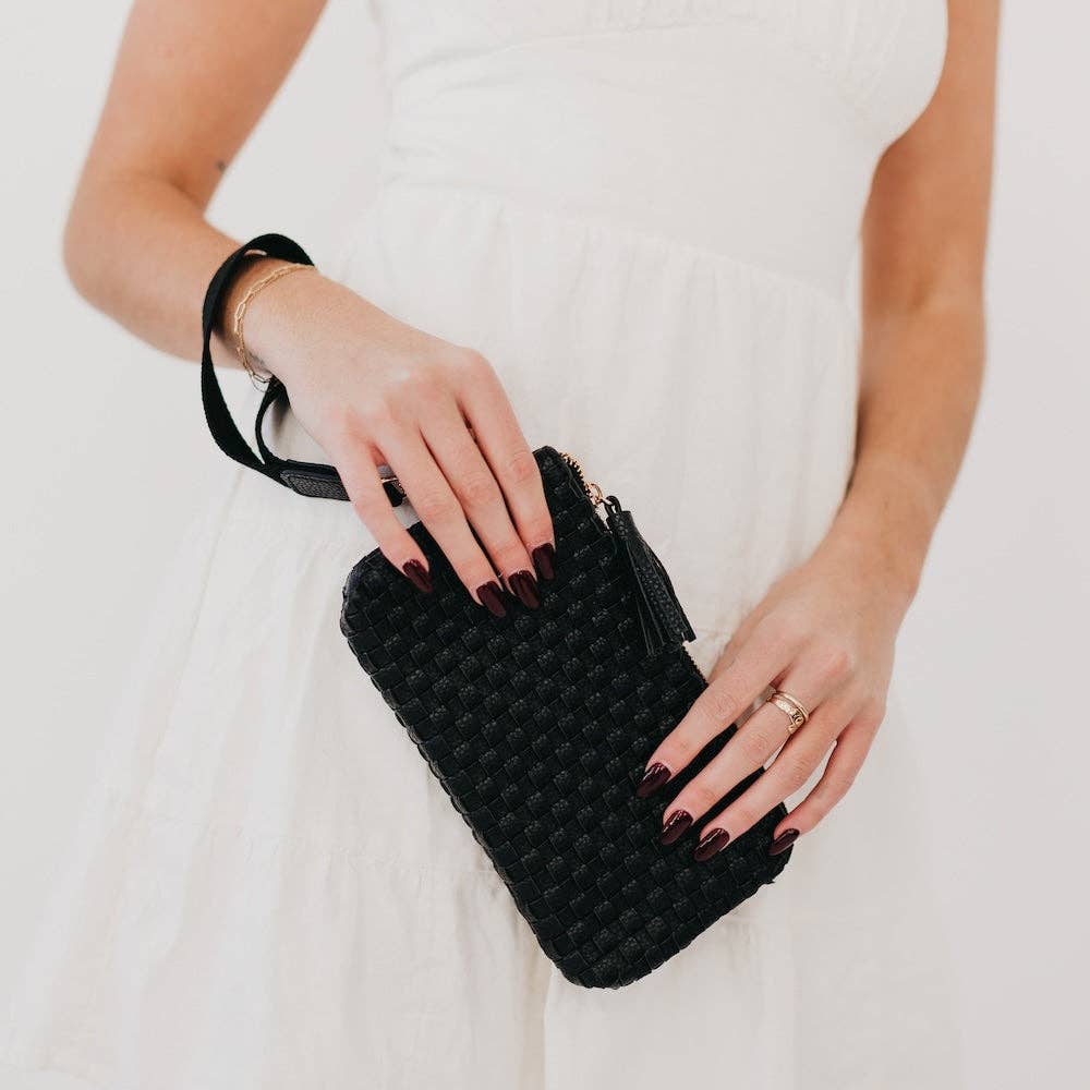 Black woven vegan leather clutch with a wristlet strap