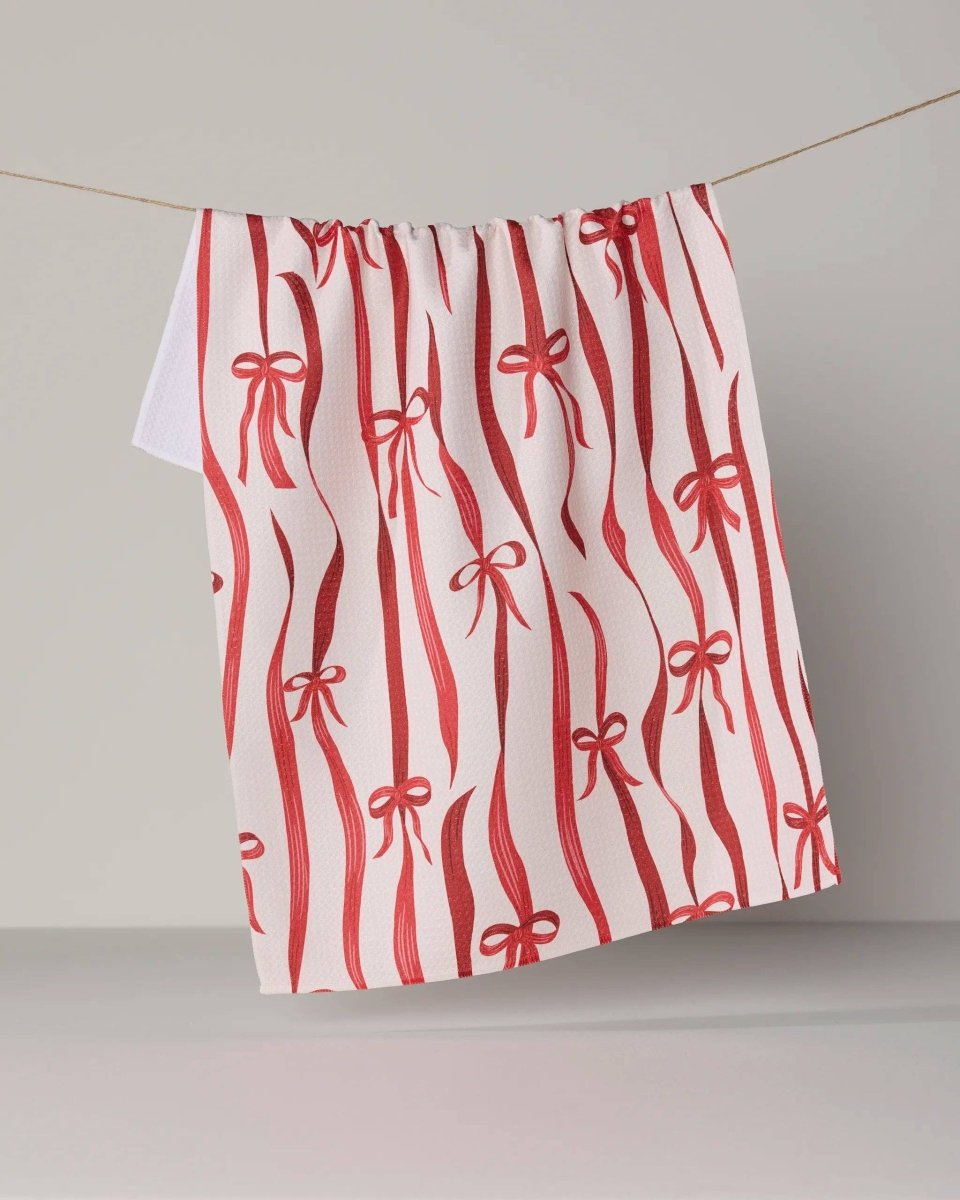 Falling Ribbon Tea Towel - Holiday 2026 - Pages & Parcels