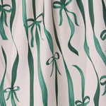 Falling Ribbon Tea Towel - Holiday 2026 - Pages & Parcels