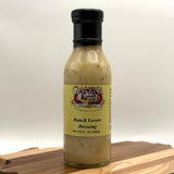 Bottle of Galena Ranch Lovers Dressing on a wooden surface with a white background