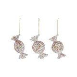 A glass candy-shaped ornament filled with confetti, one of three styles