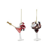 A glass cocktail ornament featuring a tipsy Santa figure, one of two styles