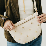 Gold-studded vegan leather bum bag with an adjustable strap