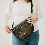 Gold-studded vegan leather bum bag with an adjustable strap