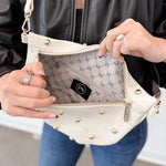 Gold-studded vegan leather bum bag with an adjustable strap