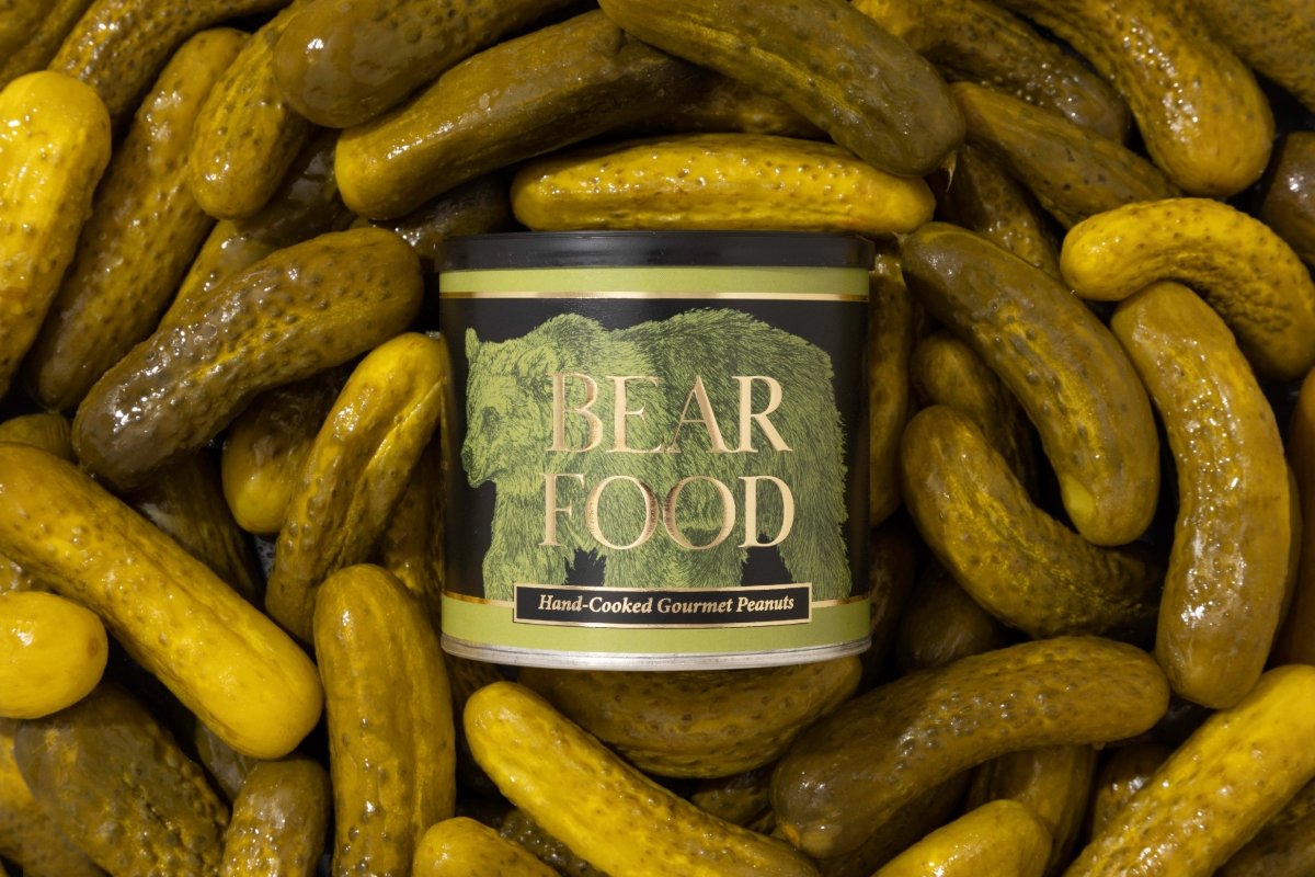 Bear Food Dill Pickle Peanuts arranged with the ingredients used in the tangy seasoning