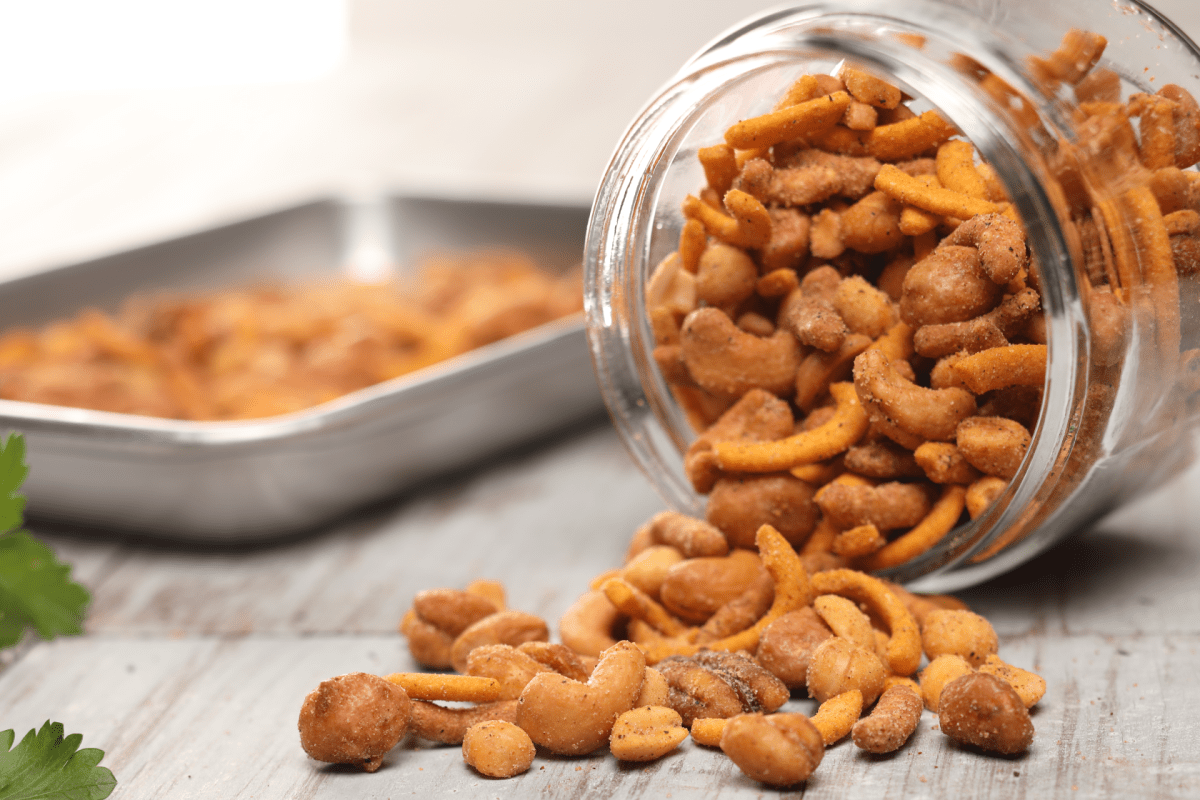 Jar of Bear Food Gourmet Bear Mix loaded with cheddar sticks, toffee peanuts, pecans, and cashews