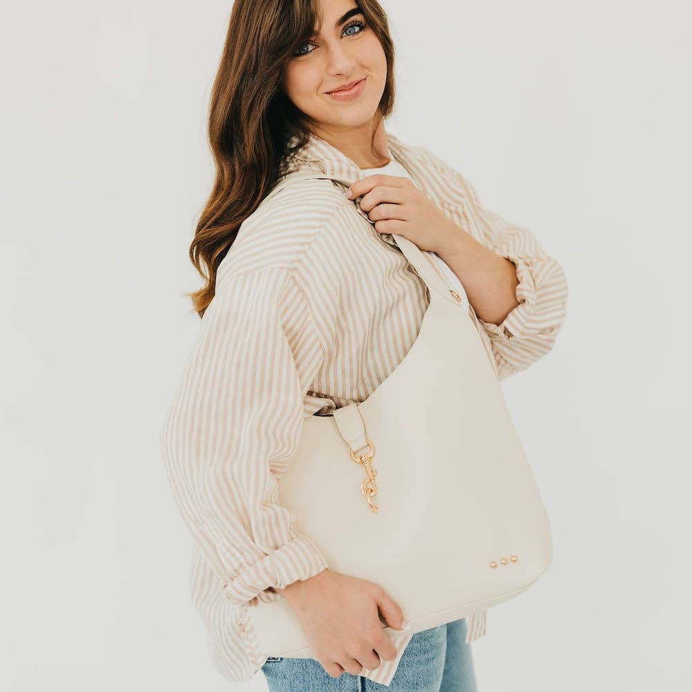 Vegan leather hobo tote bag with an exterior lock