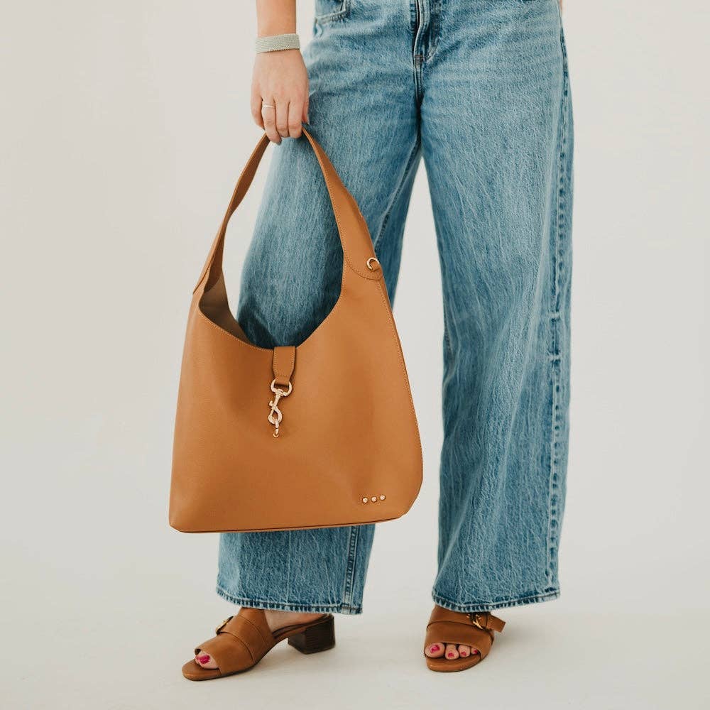 Vegan leather hobo tote bag with an exterior lock