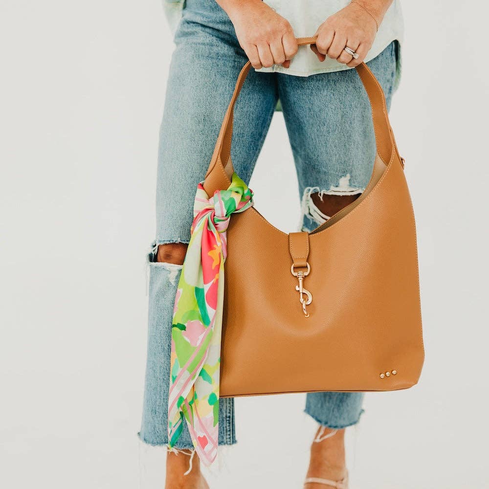 Vegan leather hobo tote bag with an exterior lock