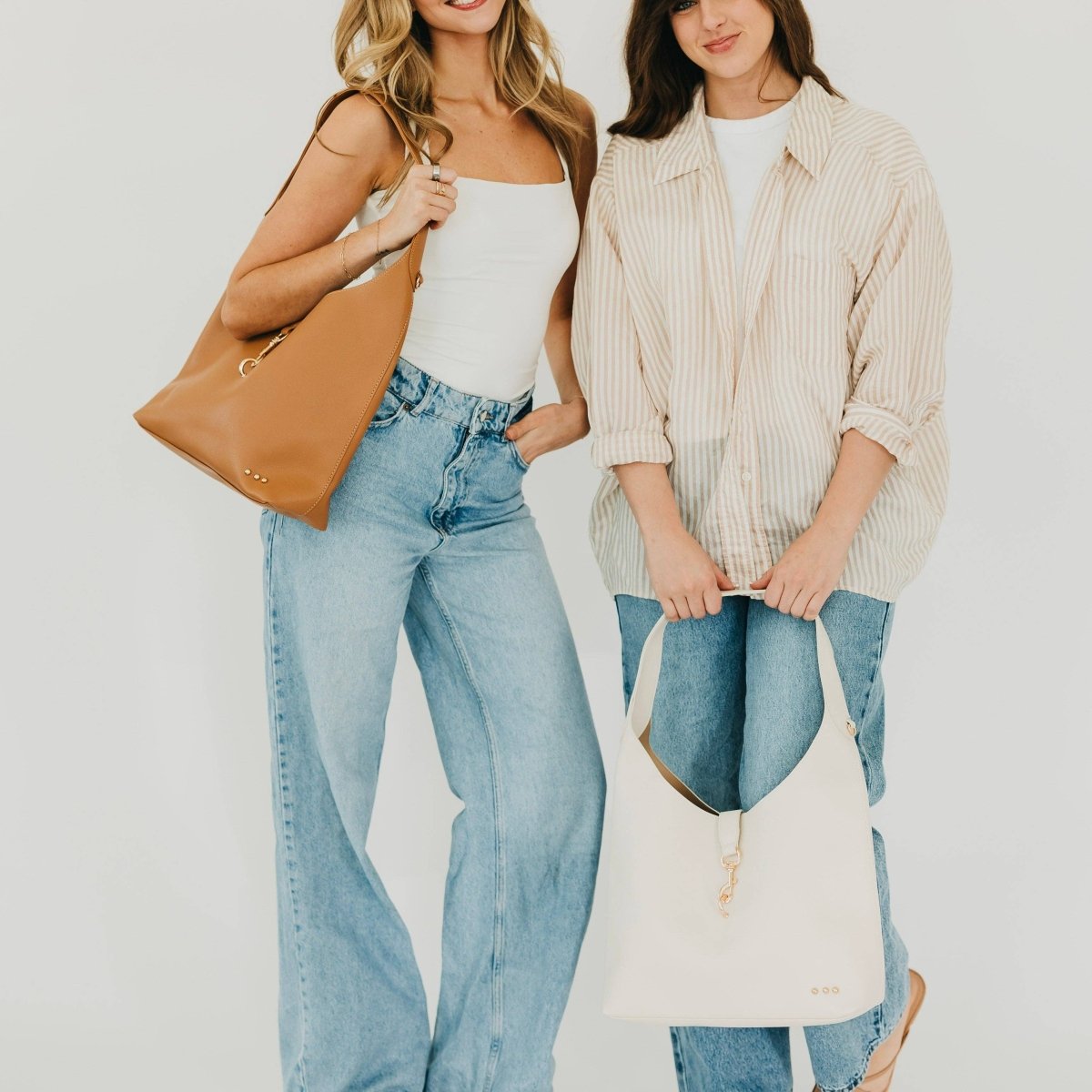 Vegan leather hobo tote bag with an exterior lock