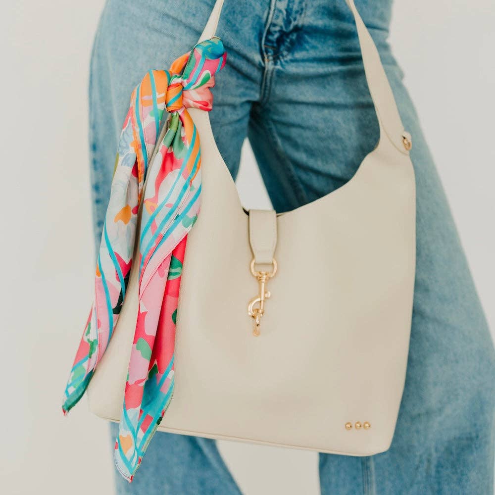 Vegan leather hobo tote bag with an exterior lock