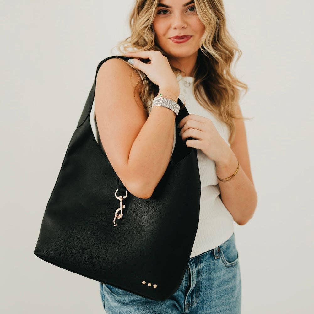 Vegan leather hobo tote bag with an exterior lock